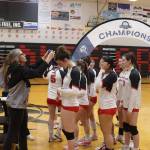 Juneau-Douglas High School: Yadaa.at Kalé volleyball players get their Region V championship medals from JDHS Athletic Director Julie Herman. Herman coached the volleyball team for Thunder Mountain High School which won three straight conference titles during the past three years until the students were consolidated into JDHS this year. (Mark Sabbatini / Juneau Empire)