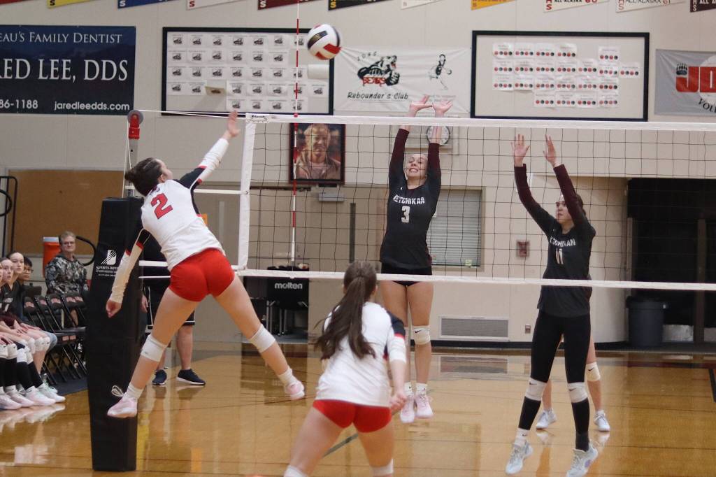 Juneau-Douglas High School: Yadaa.at Kalés Braith Dihle (2) knocks the ball past two Ketchikan High School players during Saturdays Region V tournament game at JDHS. (Mark Sabbatini / Juneau Empire)