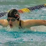 Juneau-Douglas High School: Yadaa.at Kalé sophomore Kennedy Miller swims in the girls 100 fly final during the ASAA Swim & Dive State Championships on Saturday at Anchorages Bartlett High School pool. (Klas Stolpe / Juneau Empire)