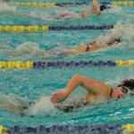Juneau-Douglas High School: Yadaa.at Kalé sophomore Amy Liddle leads Kenai junior Abigail Price and Palmer junior Kylie Benner en route to winning the girls 200 freestyle title during the ASAA Swim & Dive State Championships on Saturday at Anchorages Bartlett High School pool. (Klas Stolpe / Juneau Empire)