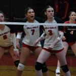 Juneau-Douglas High School: Yadaa.at Kalé senior Evelyn Richards (8), sophomore Leila Cooper (7), senior Tatum Billings (3) and junior Cambry Lockhart (4) await a serve against Wasilla in a game earlier this season at the George Houston Gymnasium. The Crimson Bears season ended with two losses in the state tournament this weekend. (Klas Stolpe / Juneau Empire file photo)