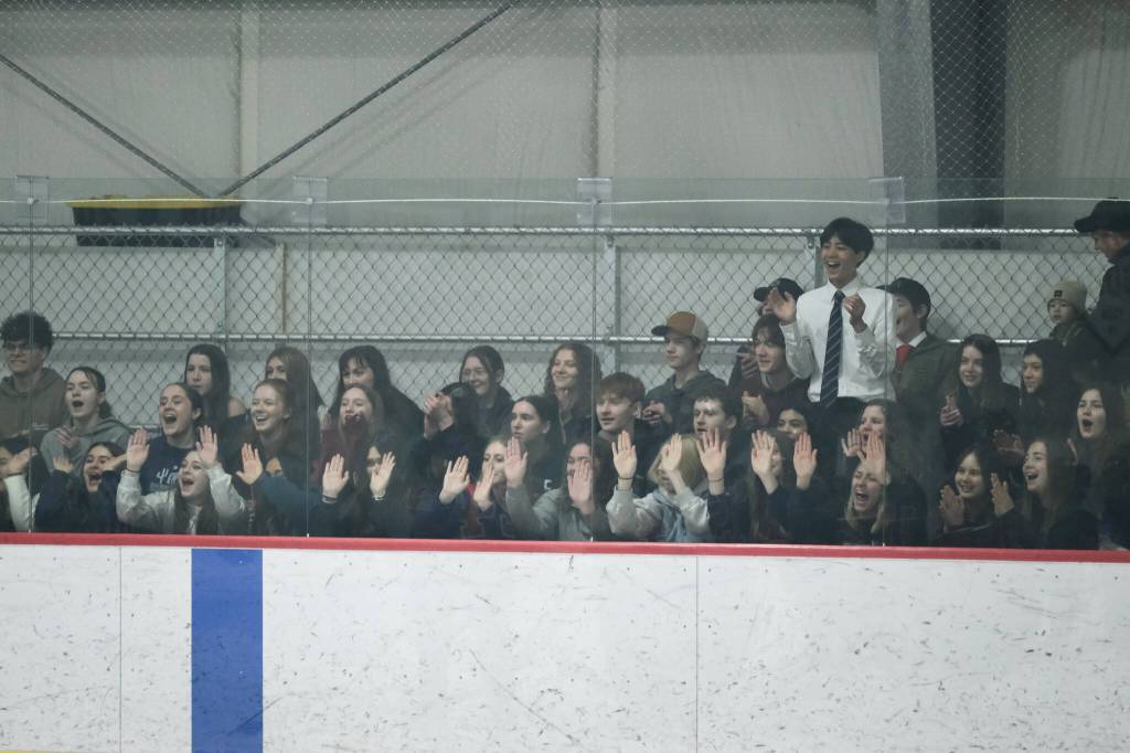 Juneau-Douglas High School: Yadaa.at Kalé fans cheer during the Crimson Bears 5-2 loss to the Patriots on Saturday at the Treadwell Ice Arena. (Klas Stolpe / Juneau Empire)