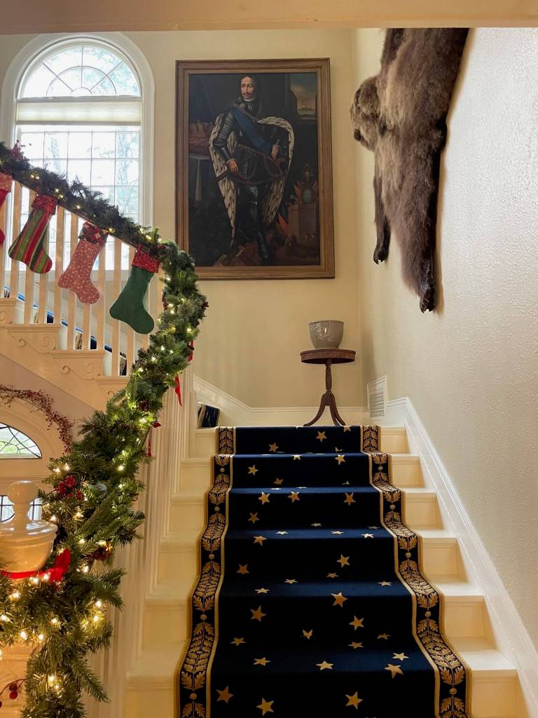 The Governors private quarters are on the second floor. This 6-foot-tall painting of Peter the Great of Russia is thought to have hung in Baranovs Castle in Sitka before the Russian America Company departed Alaska after 1867. It hangs by the staircase leading up to the second floor. (Laurie Craig / Juneau Empire)