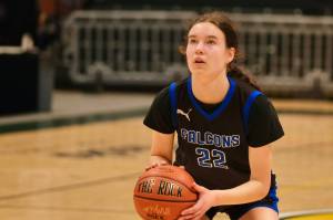 Current senior Kerra Baxter (22) shoots a free throw for now defunct Thunder Mountain High School in last seasons ASAA state championship 4th/6th place game against the Mountain City Christian Academy Lions. Baxter has signed to play Division II college basketball with the University of Alaska Anchorage Seawolves. Baxter will play for Juneau-Douglas High School: Yadaa.at Kalé this season. (Klas Stolpe / Juneau Empire)