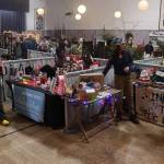 Vendors and shoppers fill the Juneau Arts and Culture Center during the Juneau Public Market on Friday. Admission is free to the JACC, where lesser-known and newer vendors often have spaces. (Mark Sabbatini / Juneau Empire)