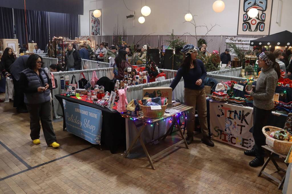 Vendors and shoppers fill the Juneau Arts and Culture Center during the Juneau Public Market on Friday. Admission is free to the JACC, where lesser-known and newer vendors often have spaces. (Mark Sabbatini / Juneau Empire)