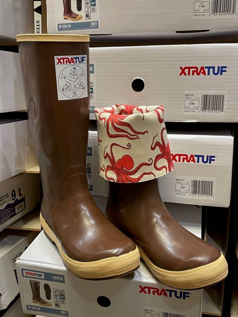 The original Salmon Sisters octopus design with the folded down liner of XtraTuf boots made for women. Homer, Alaskas commercial fishing entrepreneurial sisters were contacted in 2016 by XtraTuf makers to design the inside liner in the boot companys first style made for women. (Laurie Craig / Juneau Empire)