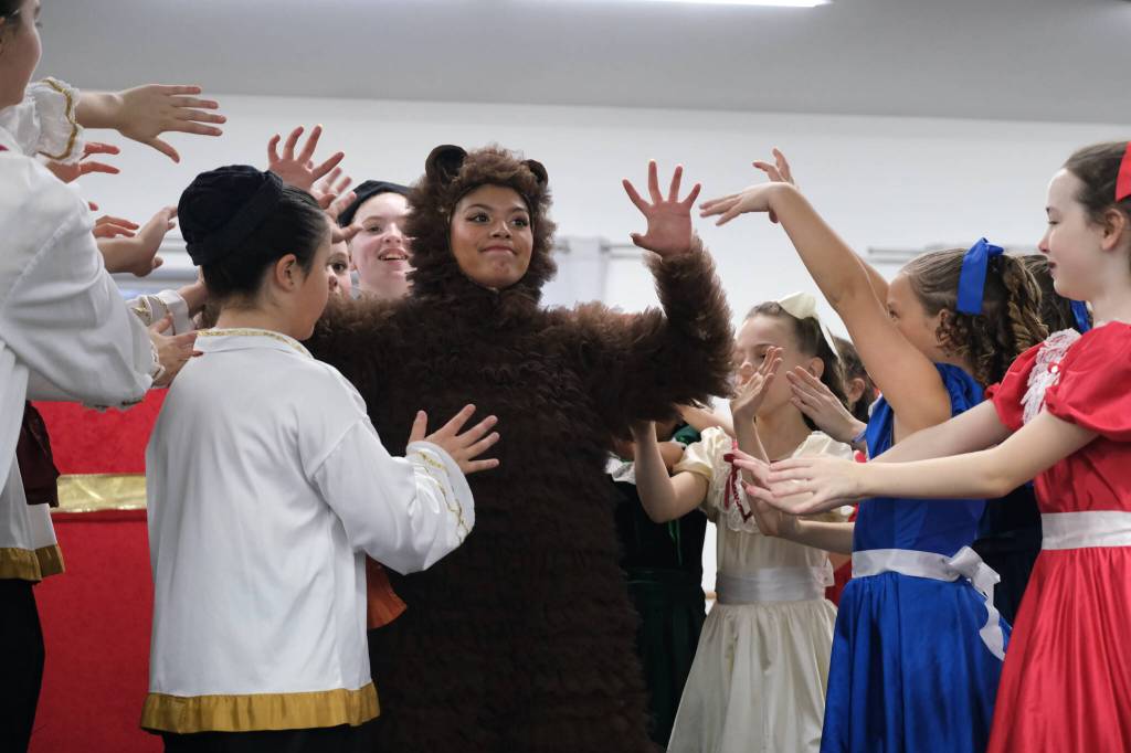 Sammara Apango as the Dancing Bear is a party hit in Juneau Dance Theatres production of The Nutcracker during dress rehearsal Sunday at the JDT studio. (Klas Stolpe / Juneau Empire)