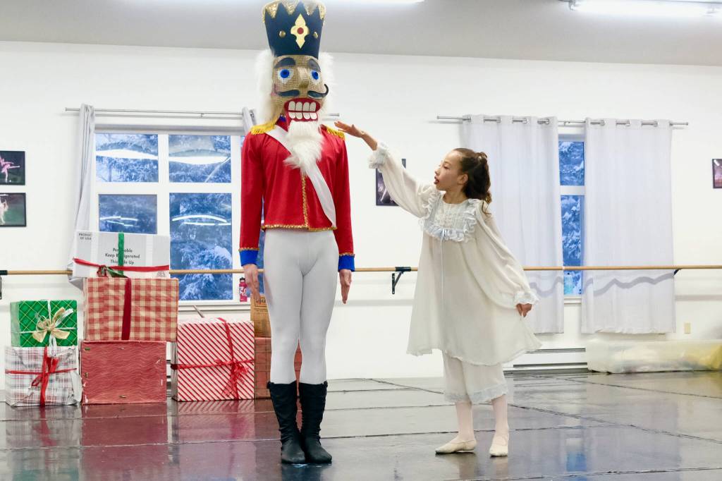 Viktor Bell as the Nutcracker and Sachiko Marks as Clara in Juneau Dance Theatres production of The Nutcracker during dress rehearsal Sunday at the JDT studio. (Klas Stolpe / Juneau Empire)