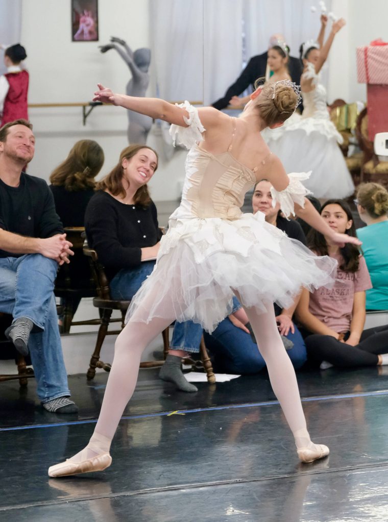 Artistic director Zachary Hench, ballet master Catherine ODay, executive director Bridget Lujan and helper Megan Lujan react to Snow Queen Mya Baird in Juneau Dance Theatres production of The Nutcracker during dress rehearsal Sunday at the JDT studio. (Klas Stolpe / Juneau Empire)