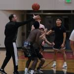 Juneau-Douglas High School: Yadaa.at Kalé boys head coach Robert Casperson starts a scrimmage game during the first day of Crimson Bears varsity basketball tryouts Wednesday at the George Houston Gymnasium. (Klas Stolpe / Juneau Empire)