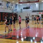 Juneau-Douglas High School: Yadaa.at Kalé girls head coach Tanya Nizich talks to Crimson Bears players during the first day of girls varsity basketball tryouts Wednesday at the George Houston Gymnasium. (Klas Stolpe / Juneau Empire)