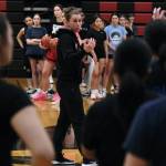 Juneau-Douglas High School: Yadaa.at Kalé girls head coach Tanya Nizich talks to Crimson Bears players during the first day of girls varsity basketball tryouts Wednesday at the George Houston Gymnasium. (Klas Stolpe / Juneau Empire)