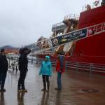 Crew of the U.S. Coast Guards Healy icebreaker talk with Juneau residents stopping by to look at the ship on Thursday at the downtown cruise ship dock. Public tours of the vessel are being offered from 3:30-5:30 p.m. Friday. (Mark Sabbatini / Juneau Empire)