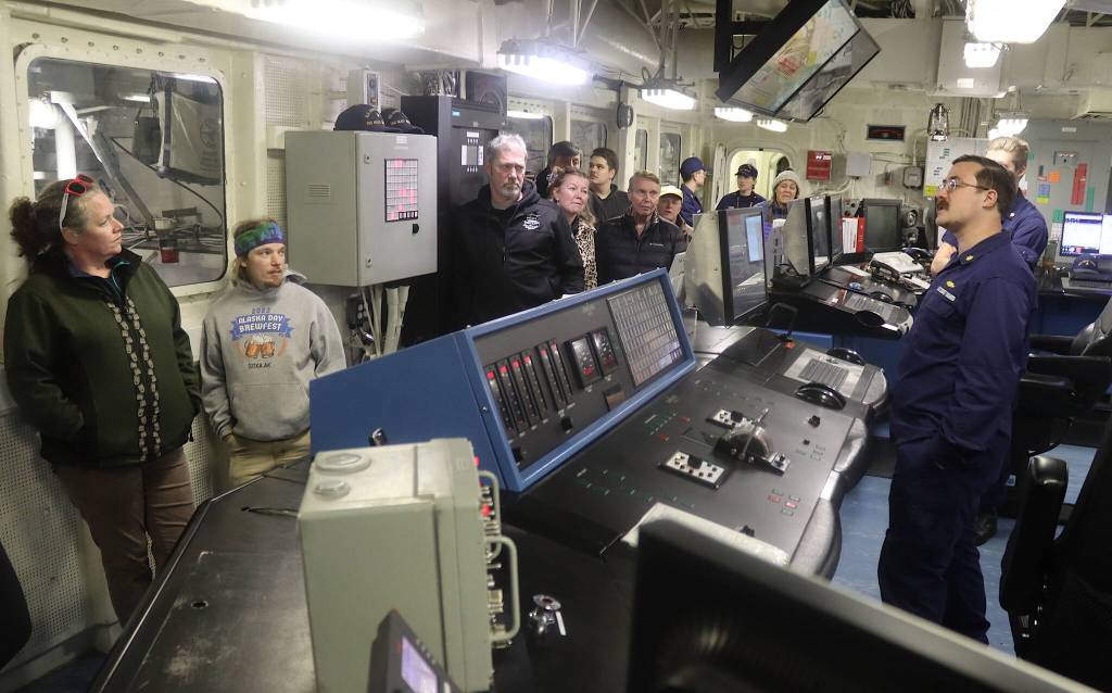 U.S. Coast Guard Lt. Cmdr. Ryan Konze explains the engine and other functions of the Healy icebreaker during a public tour Friday. (Mark Sabbatini / Juneau Empire)