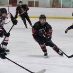 Juneau-Douglas High School: Yadaa.at Kalé senior Emilio Holbrook (37), shown in a game this season against North Pole at Treadwell Ice Arena, had three goals and two assists in two Crimson Bears wins at Kodiak over the weekend. (Klas Stolpe / Juneau Empire file photo)