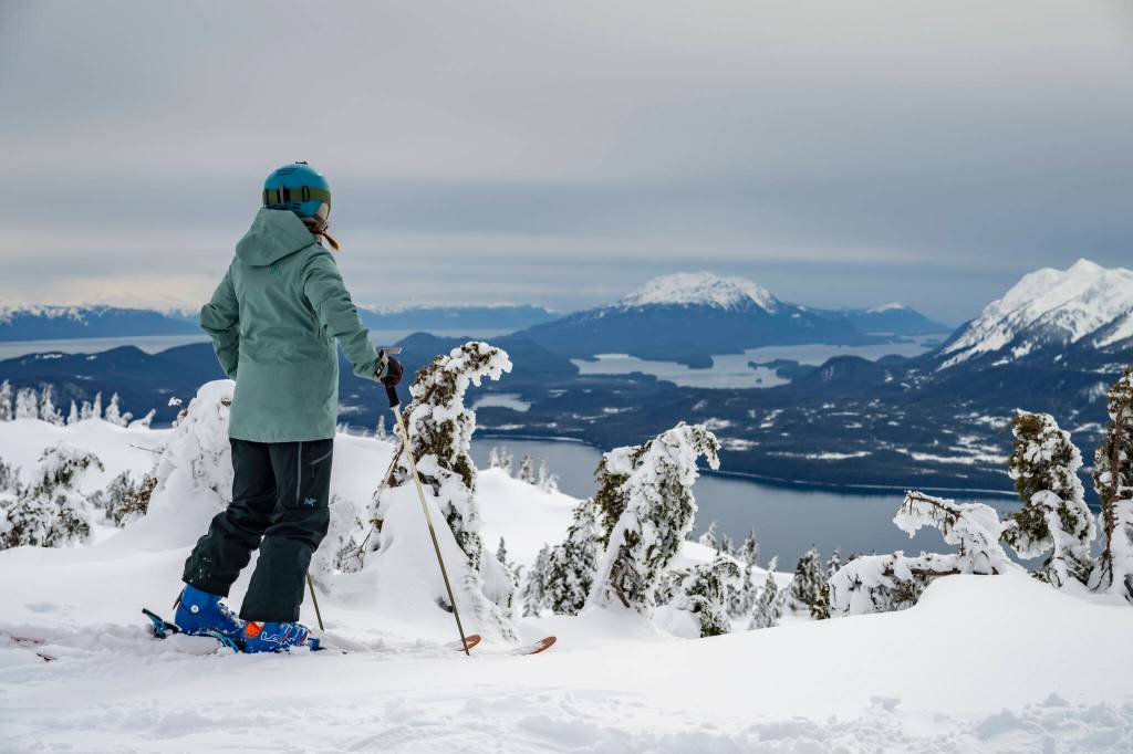 A skier takes in the sweeping view from a ridge at Eaglecrest Ski Area, which has three lifts and access to 640 acres, in Juneau, Alaska, March 10, 2024. The states capital, a popular cruise port in summer, becomes a bargain-seekers base for skiing, skating, hiking and glacier-gazing in the winter off-season. (Christopher S. Miller/The New York Times)