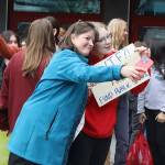 Rep. Alyse Galvin, an Anchorage independent, takes a photo with Meadow Stanley, a senior at Juneau-Douglas High School: Yadaa.at Kalé on April before they took part in a march protesting education funding from the school to the Alaska State Capitol. (Mark Sabbatini / Juneau Empire)