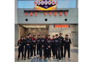 The Juneau-Douglas High School: Yadaa.at Kalé Crimson Bears boys basketball team pose upon their arrival in Las Vegas for the Tarkanian Classic Tournament. (Photo courtesy JDHS Crimson Bears)1