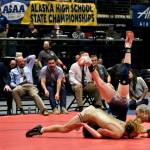 Ketchikan senior Titan Linne pins Soldotnas Titus Watts in front of the Soldotna coaches in the 125-pound Division I championship match of the 2024 ASAA/First National Bank Alaska Wrestling State Championships on Saturday at Anchorages Alaska Airlines Center. (Klas Stolpe / Juneau Empire)