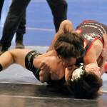 Juneau-Douglas High School: Yadaa.at Kalé freshman Joshua Beedle tries to pin Colonys Gabriel Crockett in their 112-pound fifth-place match during the 2024 ASAA/First National Bank Alaska Wrestling State Championships on Saturday at Anchorages Alaska Airlines Center. (Klas Stolpe / Juneau Empire)