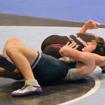 Juneau-Douglas High School: Yadaa.at Kalé senior Justus Darbonne pins Soldotnas Ryatt Weed in the 152-pound fifth-place match during the 2024 ASAA/First National Bank Alaska Wrestling State Championships on Saturday at Anchorages Alaska Airlines Center. (Klas Stolpe / Juneau Empire)