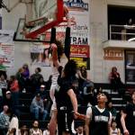 2018 Juneau-Douglas High School: Yadaa.at Kalé graduate Kolby Hoover dunks as Crimson Bears Keaton Belcourt, Pedrin Saceda-Hurt, Logan Carriker and Joren Gasga look on during alumni games Monday at the George Houston Gymnasium. (Klas Stolpe / Juneau Empire)