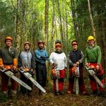 The Angoon stewardship crew hosted by Kootznoowoo Inc. alongside Southeast Alaska Watershed Coalition (SAWC) and the U.S. Forest Service. From left to right: Roger Williams, Walter Washington, Rob Cadmus (SAWC), Jamie Daniels, Justin Turner, Dean Anderson (Forest Service). The crew and partners kicked off work on the Cube Cove restoration project on Admiralty Island in 2024. (Photo by Lee House)