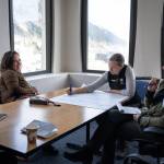 Brainstorming in a breakout group during a 2023 visioning session hosted by the U.S. Forest Services Alaska Region. The convening brought together thirty representatives from federal agencies, leaders from Central Council Tlingit and Haida Indian Tribes of Alaska (CCTHIA), and regional organizations to focus on the Southeast Alaska Sustainability Strategy and the future of land management and rural economic development in the region. From left to right: Raymond Paddock III (CCTHIA), Alana Peterson (Spruce Root), Sara Doyle (National Park Service, Glacier Bay National Park), and Ann Fischer (U.S. Natural Resources Conservation Service). (Photo by Lee House)