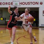 Juneau-Douglas High School: Yadaa.at Kalé junior Cambry Lockhart (3) pressures Kenai sophomore Gracee Every (10) in the Crimson Bears 57-13 win over the Cardinals during Saturday action at the George Houston Capital City Classic in Juneau. (Klas Stolpe / Juneau Empire)