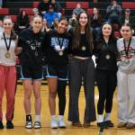 The 2024 George Houston Capital City Classic girls All Tournament Team, from left-to-right, MVP Kerra Baxter (Juneau-Douglas High School: Yadaa.at Kalé), Gwen Nizich (JDHS), Kaitlyn Farr (Chugiak), Natalie Horn (Chugiak), Cailynn Baxter (JDHS), Layla Tokuoka (JDHS), Lea Armour (Klawock) and Ellsi Miller (Kenai). (Klas Stolpe / Juneau Empire)