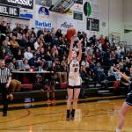 Juneau-Douglas High School: Yadaa.at Kalé junior Gwen Nizich (11) shoots from past the arch against Chugiak during the Crimson Bears 51-38 win over the Mustangs in the girls championship game at the George Houston Capital City Classic on Sunday in Juneau. (Klas Stolpe / Juneau Empire)