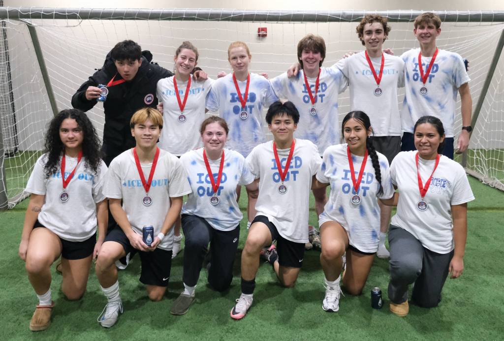 The 32nd Annual Holiday Cup Soccer Tournament Seniors/College Division champions Iced Out pose Tuesday, Dec. 31, at the Dimond Park Field House after victory. (Klas Stolpe / Juneau Empire)