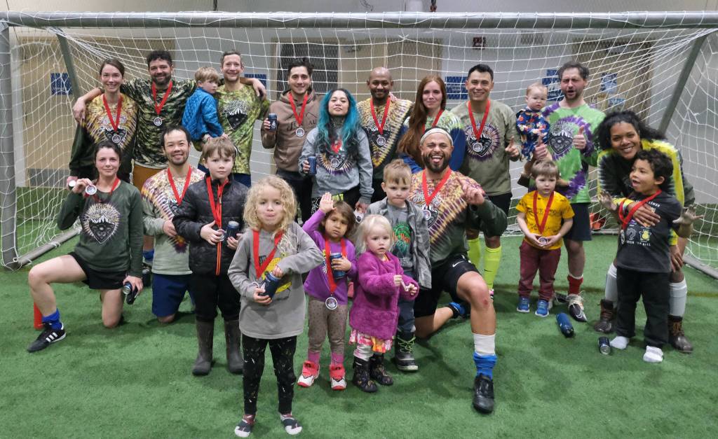 The 32nd Annual Holiday Cup Soccer Tournament Classics Division champions Chilkat Bandits pose Tuesday, Dec. 31, at the Dimond Park Field House after victory. (Klas Stolpe / Juneau Empire)