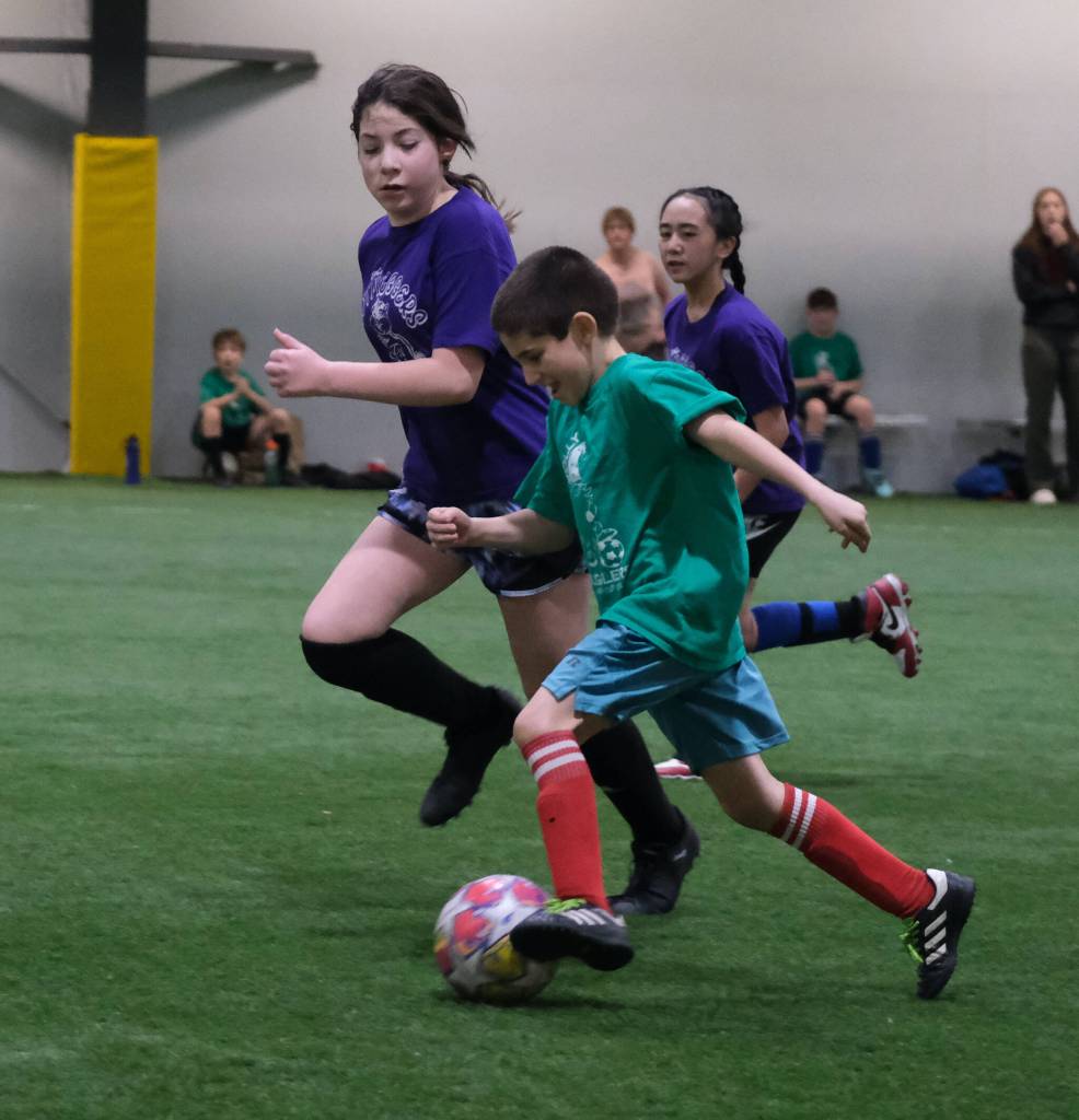 Elementary Division action at the 32nd Annual Holiday Cup Soccer Tournament on Tuesday, Dec. 31, at the Dimond Park Field House. (Klas Stolpe / Juneau Empire)