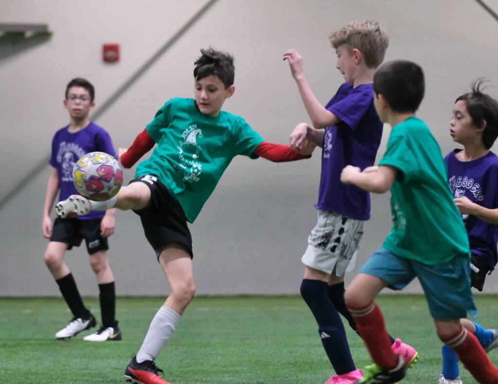 Elementary Division action at the 32nd Annual Holiday Cup Soccer Tournament on Tuesday, Dec. 31, at the Dimond Park Field House. (Klas Stolpe / Juneau Empire)