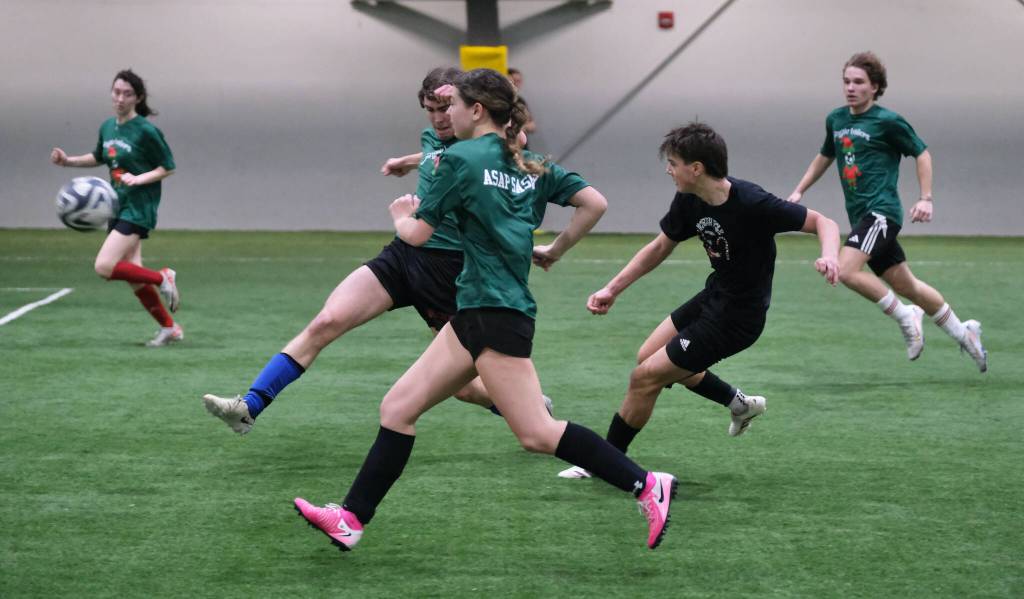 High School Division action at the 32nd Annual Holiday Cup Soccer Tournament on Tuesday, Dec. 31, at the Dimond Park Field House. (Klas Stolpe / Juneau Empire)