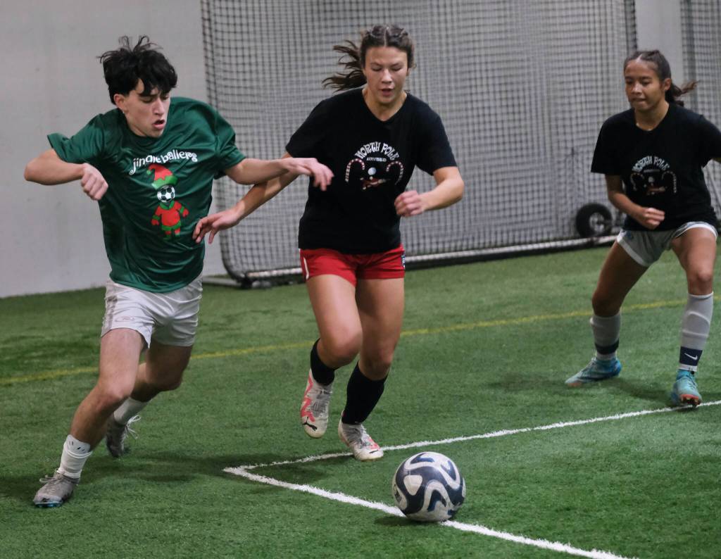 High School Division action at the 32nd Annual Holiday Cup Soccer Tournament on Tuesday, Dec. 31, at the Dimond Park Field House. (Klas Stolpe / Juneau Empire)