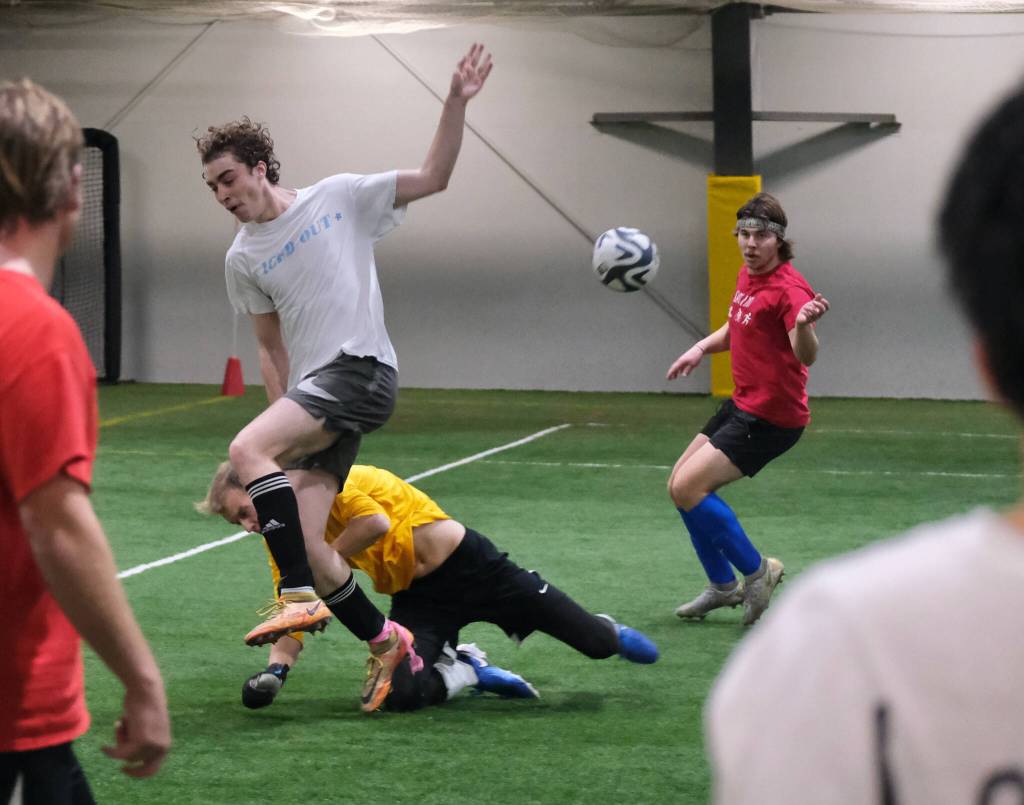Senior/College Division action at the 32nd Annual Holiday Cup Soccer Tournament on Tuesday, Dec. 31, at the Dimond Park Field House. (Klas Stolpe / Juneau Empire)