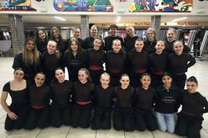 The Juneau-Douglas High School: Yadaa.at Kalé Dance Team pose for a photo in the JDHS commons before Saturdays Crimson Bears basketball game against Ketchikan. (Klas Stolpe / Juneau Empire)