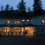 Haven House, Tlingit and Haidas third shelter under their Reentry and Recovery Program, is seen with lights on in the dark. (Jasz Garrett / Juneau Empire)