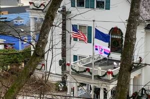 A pro-life flag has been flying along with the U.S. flag and Alaska state flag outside the Governors Residence since last January. (Mark Sabbatini / Juneau Empire file photo)