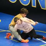 Juneau-Douglas High School: Yadaa.at Kalé sophomores Felix Hesson and Camden Messmer work on a technique Monday during a three-day wrestling clinic at the Juneau Wrestling Center led by Askren Wrestling Academy coach Wilder Wichman. (Klas Stolpe / Juneau Empire)