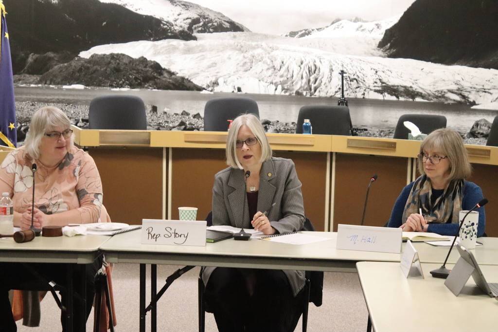 State Rep. Andi Story (center), a Juneau Democrat, discusses the legislative session that started this week during a joint meeting between the local legislative delegation and Juneau Assembly on Thursday in the Assembly Chambers, as Mayor Beth Weldon (left) and Assembly Member Maureen Hall listen. (Mark Sabbatini / Juneau Empire)