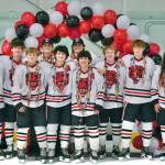 The Juneau-Douglas High School: Yadaa.at Kalé Crimson Bears seniors pose for a photo before their game Friday against the visiting Kenai Kardinals at Treadwell Ice Arena. The teams play Saturday at 8:30 a.m. (Klas Stolpe / Juneau Empire)