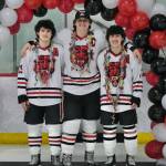 Juneau-Douglas High School: Yadaa.at Kalé senior co-captains Dylan Sowa (35), Luke Bovitz (4) and Emilio Holbrook pose during Friday senior night ceremonies at Treadwell Ice Arena. (Klas Stolpe / Juneau Empire)