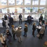 Hosts and guests mingle at a fundraising brunch on behalf of the Alaska Cultural Trust at the Rie Muñoz Gallery on Sunday. (Mark Sabbatini / Juneau Empire)