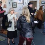 Hosts and guests mingle at a fundraising brunch on behalf of the Alaska Cultural Trust at the Rie Muñoz Gallery on Sunday. (Mark Sabbatini / Juneau Empire)