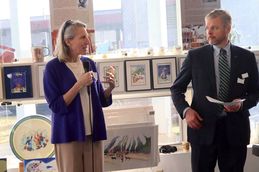 Nina Kemppel (left), former president and CEO of the Alaska Community Foundation, and Alaska State Council on the Arts Chairman Benjamin Brown address attendees at a fundraising brunch on behalf of the Alaska Cultural Trust at the Rie Muñoz Gallery on Sunday. (Mark Sabbatini / Juneau Empire)