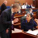 State Rep. Maxine Dibert (right), a Fairbanks Democrat, confers with Rep. Calvin Schrage (I-Anchorage) about a resolution opposing the change of Denali back to Mount McKinley during the House floor session at the Alaska State Capitol on Monday. (Mark Sabbatini / Juneau Empire)
